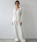 Suit with a jumper and bell-bottomed trousers milk